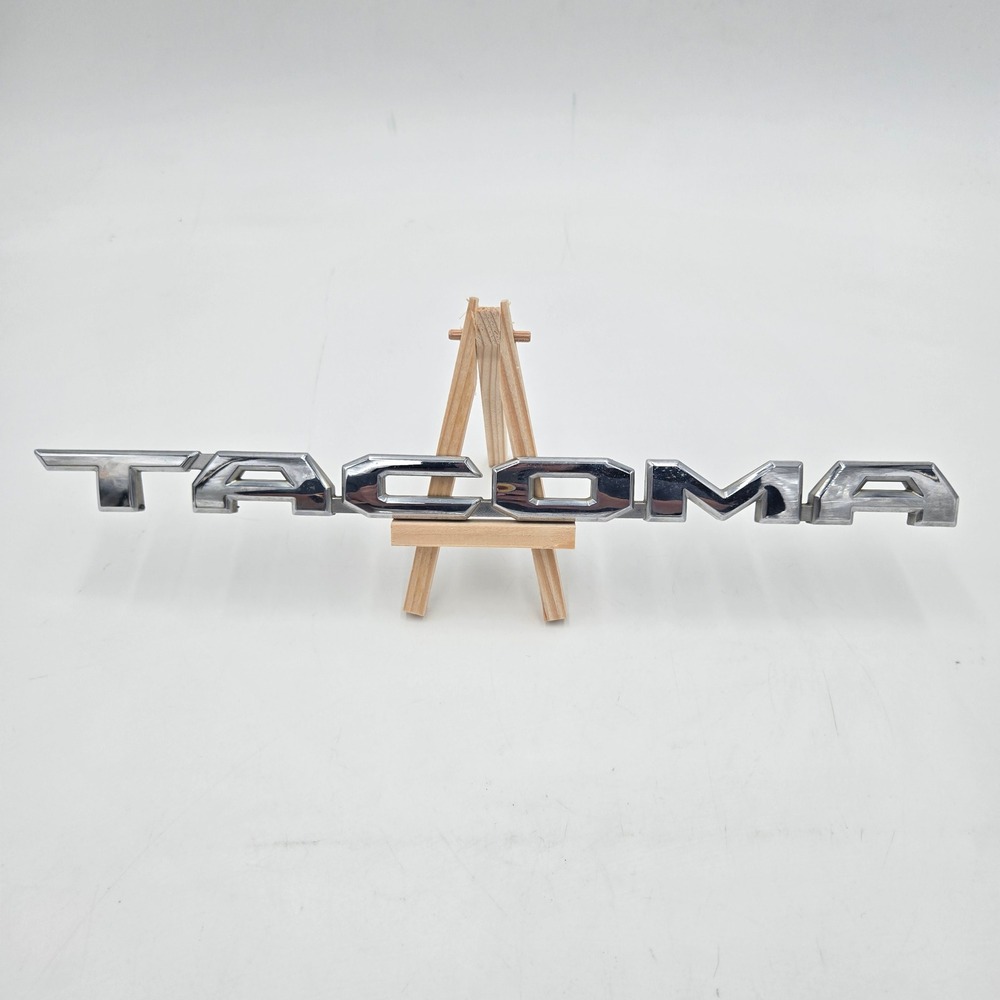 2016-2019 Toyota Tacoma Tailgate Door Emblem Badge Chrome OEM 75471-04030